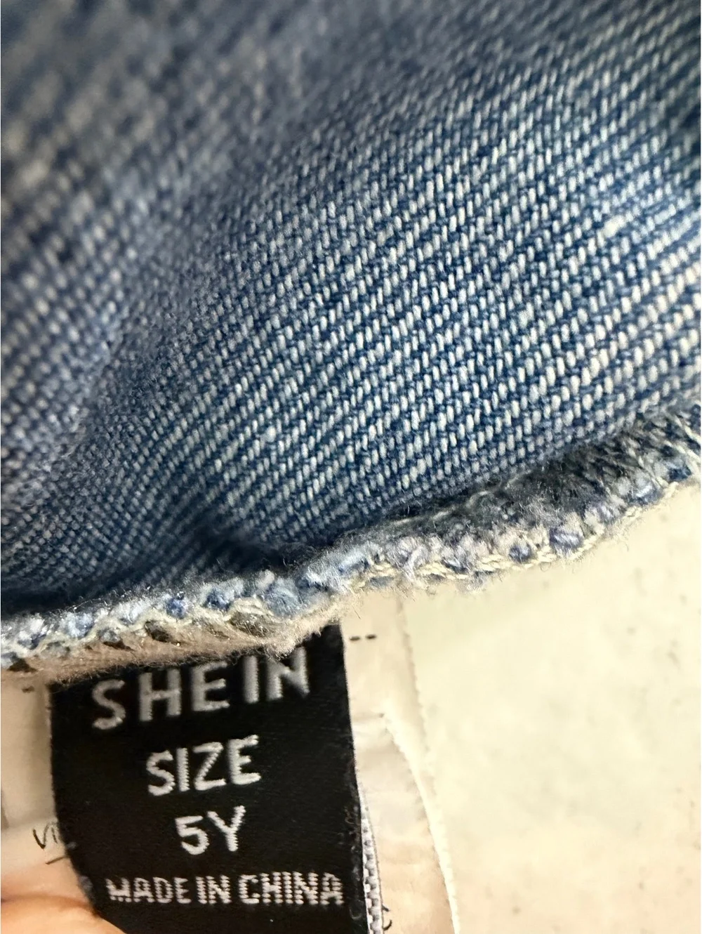 SHEIN kids denim shorts with pink hearts
